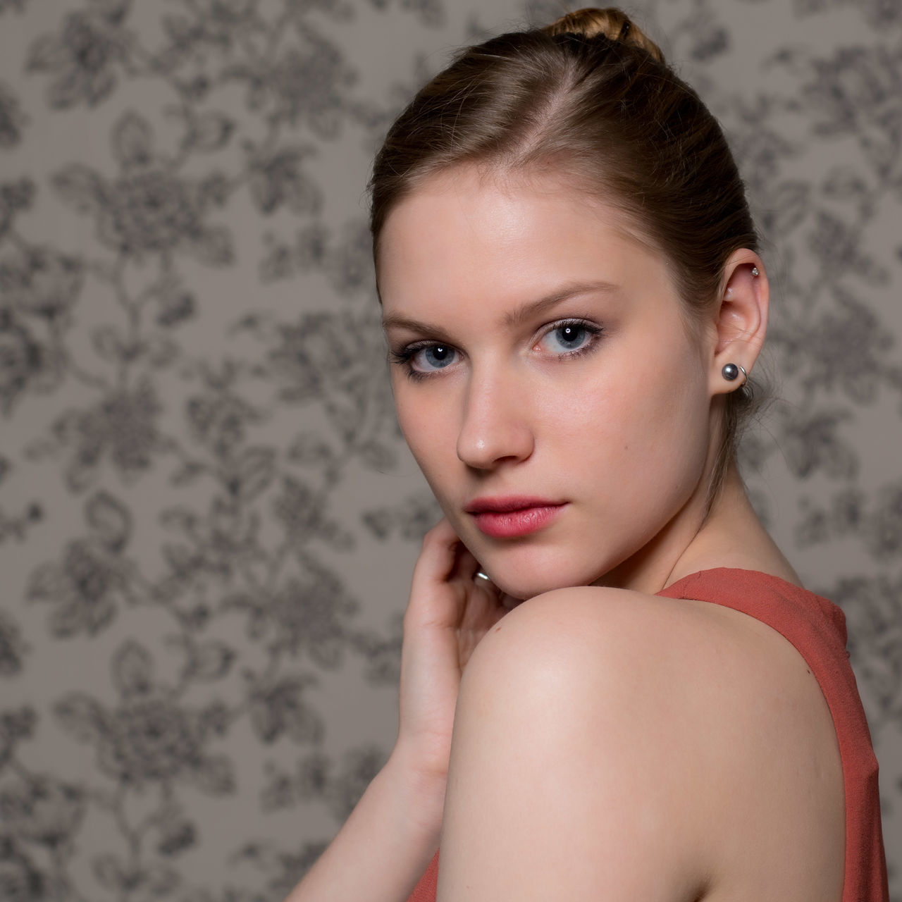 portrait, human hair, women, one person, adult, looking at camera, hairstyle, human face, young adult, indoors, fashion, headshot, studio shot, skin, long hair, portrait photography, blond hair, brown hair, female, photo shoot, elegance, make-up, serious, eyebrow, lip, person, blue eyes, glamour, human eye, eye, human head, chignon, clothing, emotion
