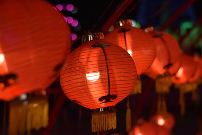 Close-up of illuminated lantern hanging at night