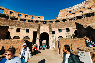 Group of people in front of historical building