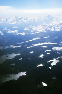 Low angle view of aerial view of sea against sky