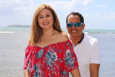 Portrait of smiling friends at beach