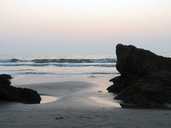 Scenic view of sea at sunset