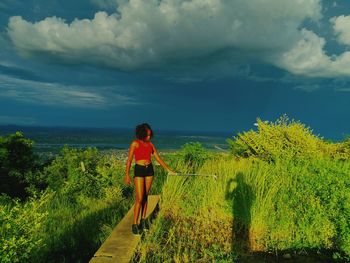 Rear view of woman on beach