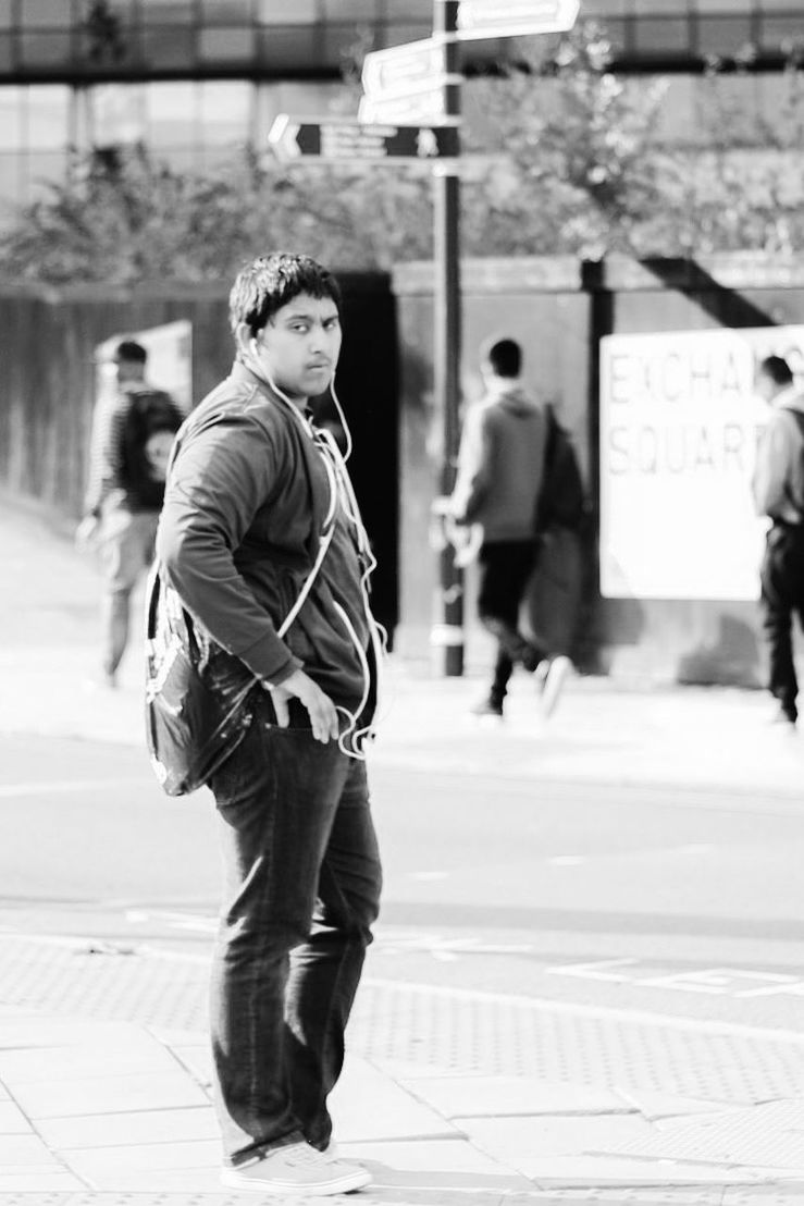 full length, focus on foreground, rear view, street, walking, casual clothing, men, lifestyles, leisure activity, boys, childhood, person, city, togetherness, city life, day, sidewalk, incidental people