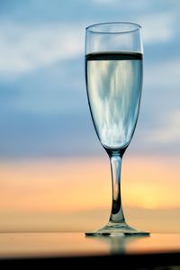 Close-up of wineglass on table