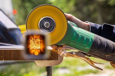 Person working on metal structure