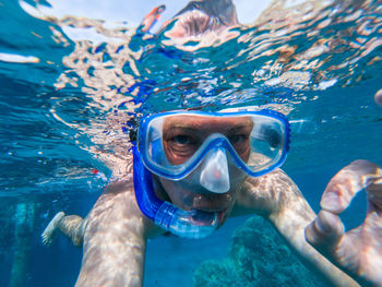 Portrait of man snorkeling in sea