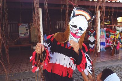 Full length of man wearing mask