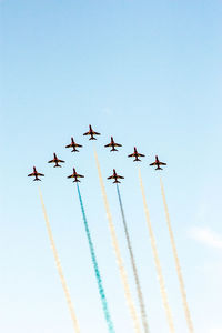 Low angle view of airplane flying in sky