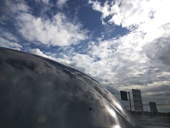 Low angle view of airplane against sky