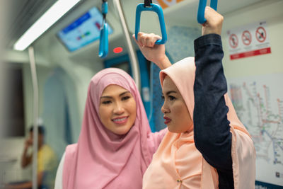 Women in metro train