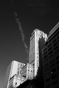 Low angle view of buildings against sky in city