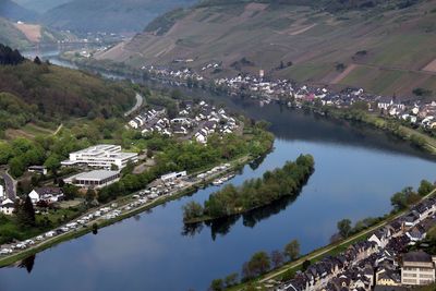 High angle view of buildings by lake