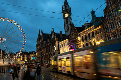 Illuminated buildings in city at night