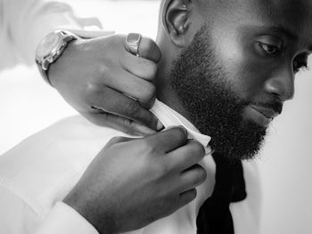 Close-up of young man wearing bow tie 