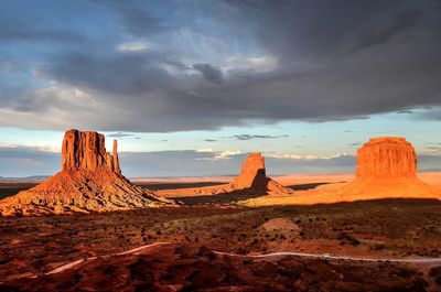 Panoramic view of rock formations against sky