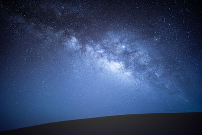 Low angle view of stars in sky at night