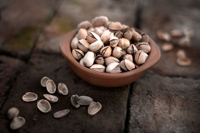 Close-up of pistachio in bowl on table