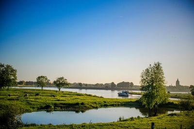 Scenic view of lake against clear sky