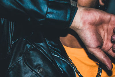 Midsection of man wearing mask