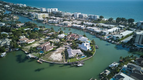 High angle view of city by sea