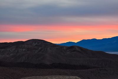 Scenic view of mountains against sky during sunset