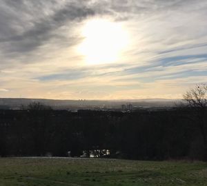 Scenic view of landscape against sky during sunset