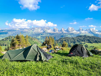 Panoramic view of tent on field against sky