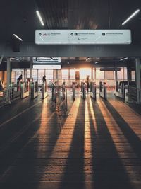 People walking in illuminated airport