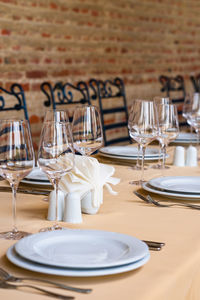 Wine glasses on table at restaurant