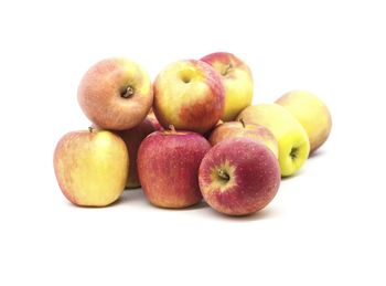 Close-up of apples on white background