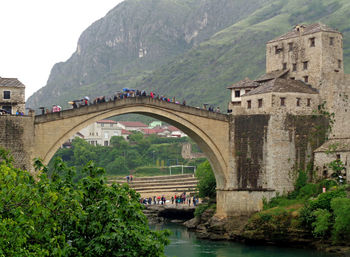 Arch bridge over river