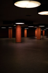 Interior of illuminated empty parking lot