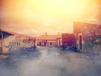 House against sky during sunset