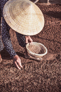 High angle view of hands working