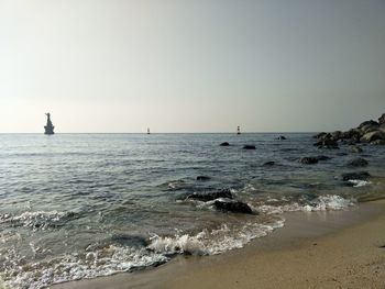 Scenic view of sea against clear sky