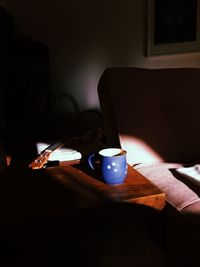 Man using laptop on table at home