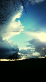 Scenic view of landscape against cloudy sky