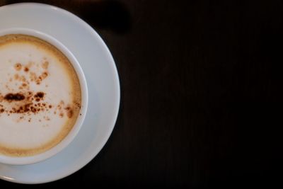 Directly above shot of cappuccino on table