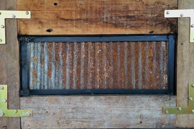 Closed metal door on wall