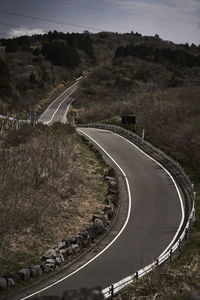 High angle view of vehicles on road against sky