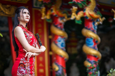 Full length of woman standing in traditional clothing
