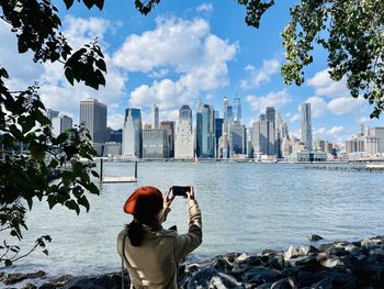 Rear view of woman looking at sea