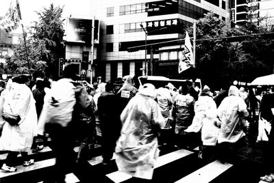 People walking on street in city