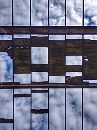 Digital composite image of building against sky