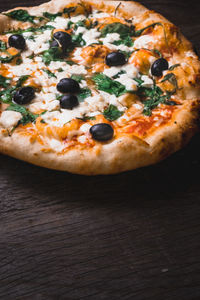 High angle view of pizza on table