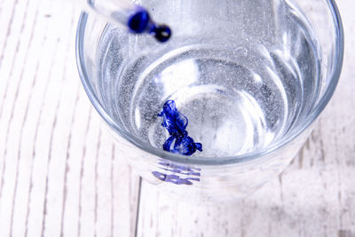 High angle view of drink in glass on table