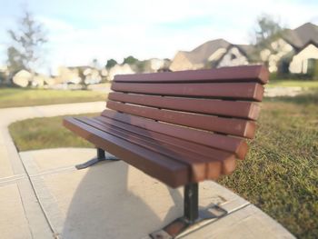 Close-up of bench in park