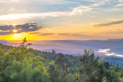 Scenic view of landscape against sky during sunset