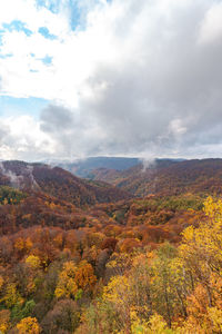 Scenic view of landscape against sky during autumn